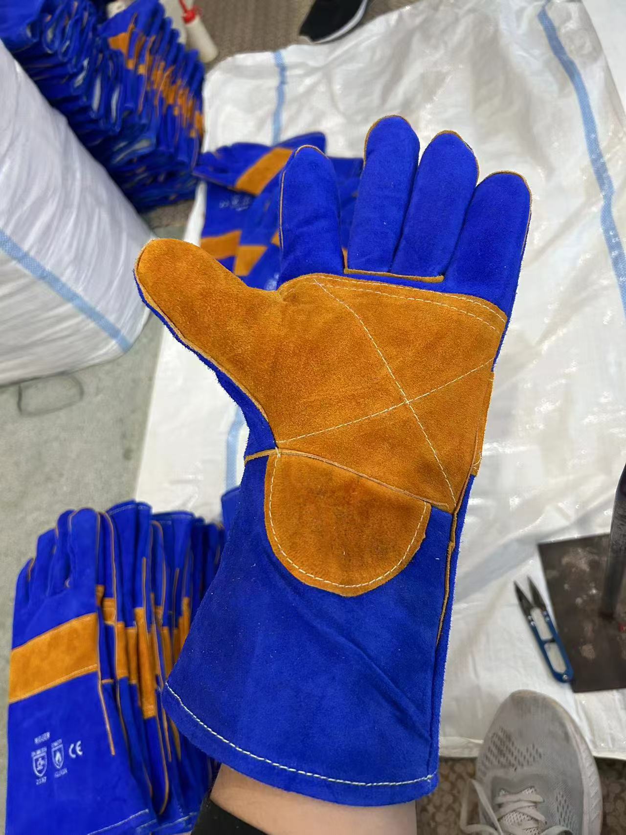 Blue leather work glove